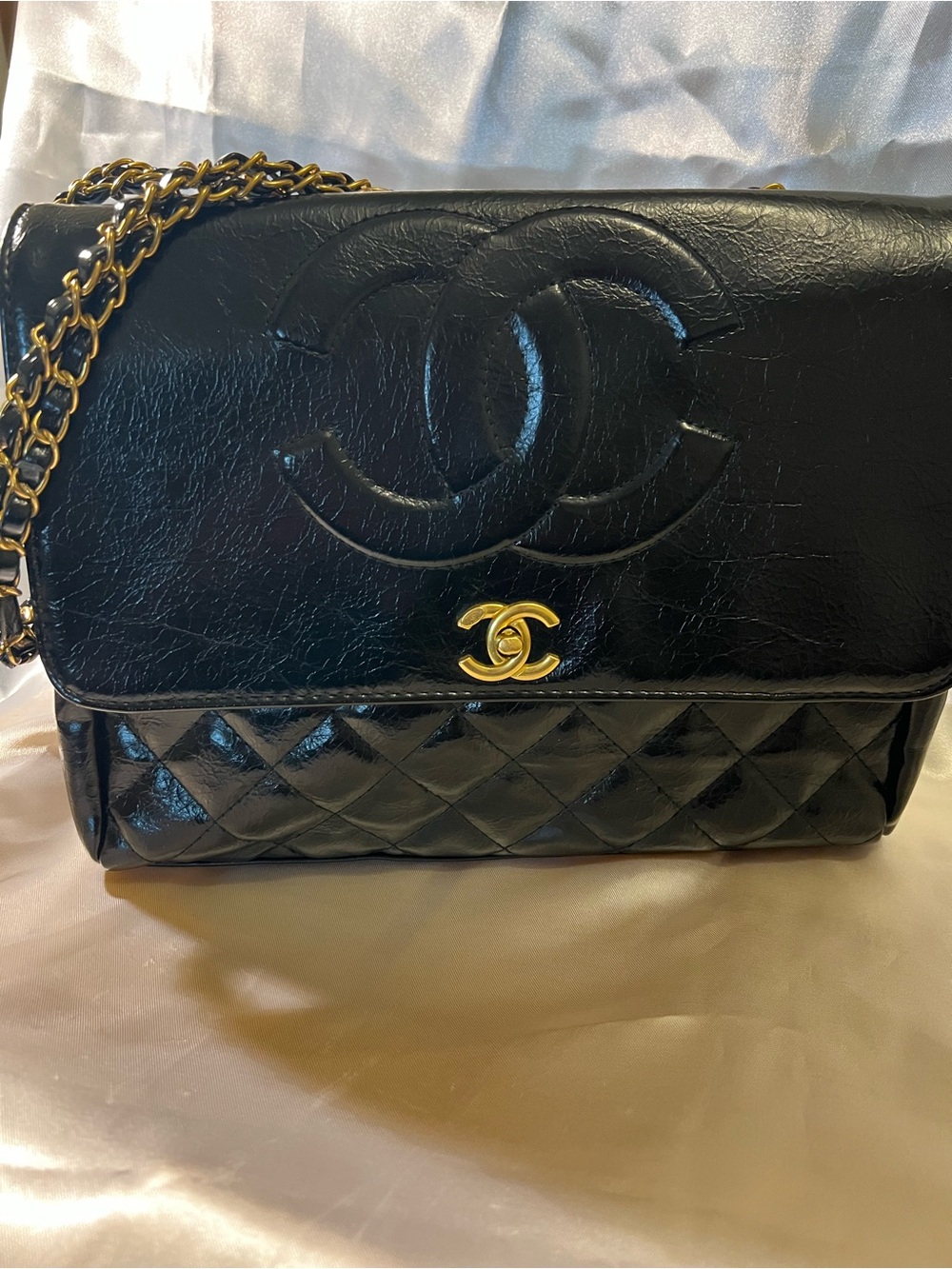 Black Quilted Lambskin Shoulder Bag with Gold Hardware. New